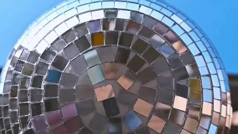 Shiny silver disco ball. disco ball with light reflections, closeup backgroun Stock Footage 265758313