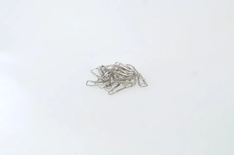 Shiny silver paper clips Stock Photos