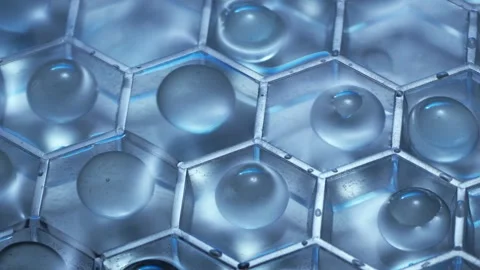 Shiny spheres getting washed in slow motion Stock Footage 165043370