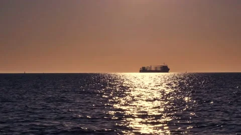 Shiny sun reflections. Sparkling sea water. Ocean waves. Ships. Bird. Real time. Stock Footage 155372807