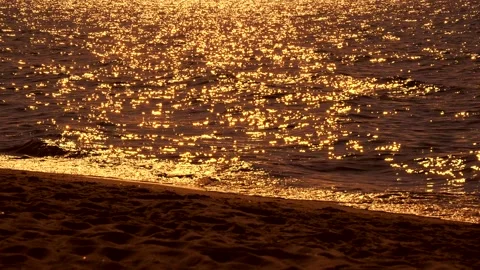 Shiny sun reflections in water. Close up ocean with small waves. Sunny day. Stock Footage 155278547