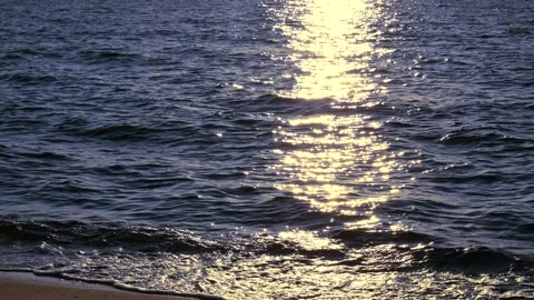 Shiny sun reflections in water. Close up ocean with glittering small waves. Stock Footage 155382997
