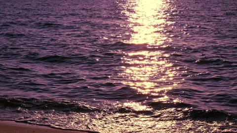 Shiny sun reflections in water. Close up ocean with glittering small waves. Stock Footage 155383016