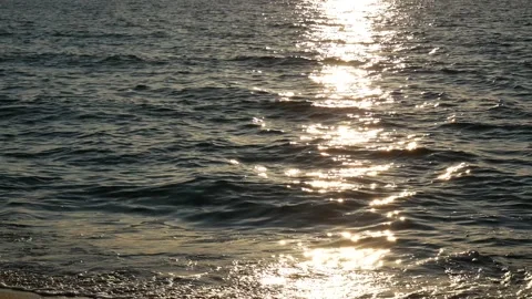 Shiny sun reflections in water. Close up ocean with glittering small waves. Stock Footage 155387514