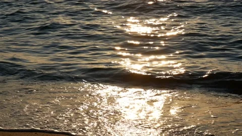 Shiny sun reflections in water. Close up ocean with glittering small waves. Stock Footage 155390724