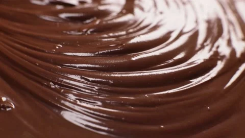 Shiny surface of chocolate hazelnut butter rotates Stock Footage 230180455