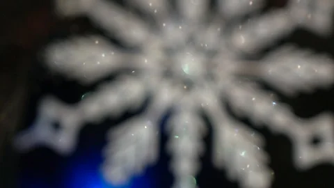 Shiny white artificial snowflake decorated with glitter powder, close-up 스톡 동영상 99148924