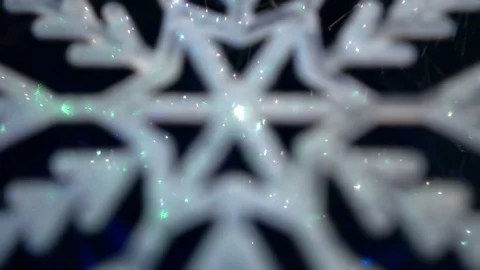 Shiny white artificial snowflake decorated with glitter powder, close-up 스톡 동영상 99148937