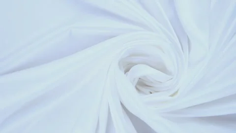 Shiny white flowing cloth texture shot in close up view macro shot. Wavy clean s Stock Footage 277352208