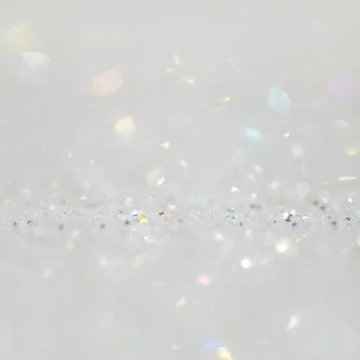 Shiny white glitter textured background Stock Photos
