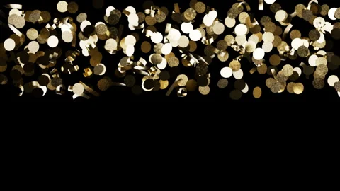 Shiny yellow metallic elements raining down over dark copy space Видео 342132473