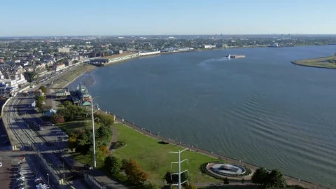 Ship and Barge pass by in New Orleans - TimeLapse Stock Footage