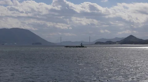 Ship and Bridge in Japan’s Seto Inland Sea Stock Footage 45604034