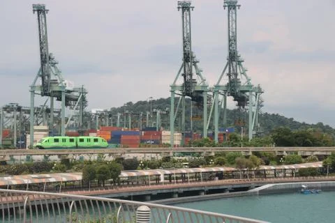 Ship and loading cranes on Sentosa Island Singapore Stock Photos