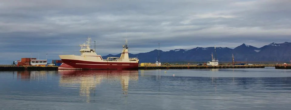 Ship and mountain range. Stock Photos
