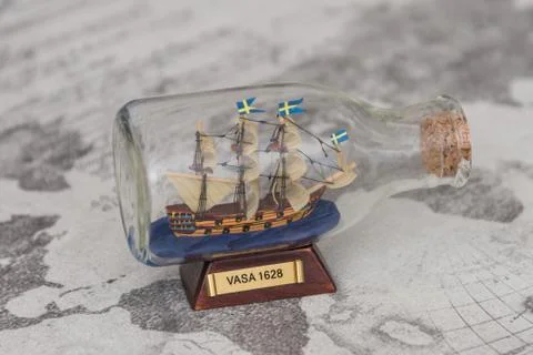 Ship on the background of the world map Stock Photos