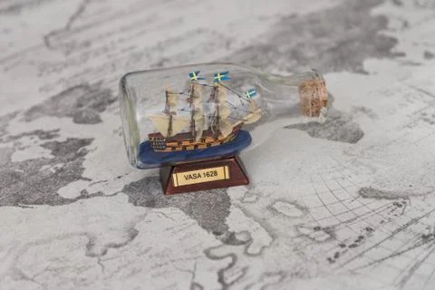 Ship on the background of the world map Stock Photos