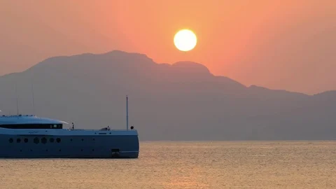 Ship at beautiful orange sunset Stock Footage 81545403