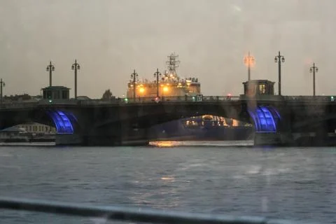 The ship behind the bridge. Stock Photos