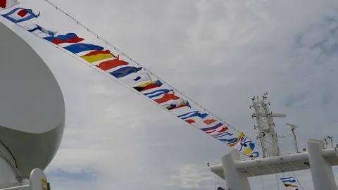Ship board flags flutter in the wind Video stock 106867962