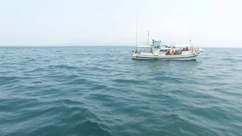 Ship Boat Swaying on Waves in the Ocean Sea Bay Stock Footage 85081341