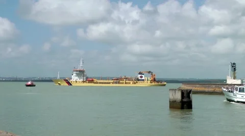 Ship boats leaving harbour cloudy sky Stock Footage 60633661