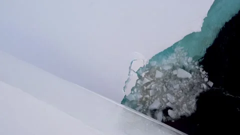 Ship bow breaking sea ice first contact Antarctica, 4K Vídeos de archivo 332399088