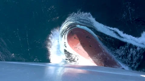 Ship bow bulb cutting through ocean water close view, 4K Stock Footage 332359135