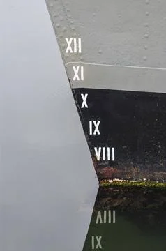 Ship bow with Roman numerals indicating waterline depth measurements Stock Photos