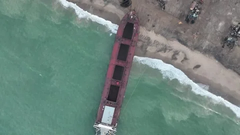 Ship carcass at Gadani Breaking Yard, Pakistan. Aerial topview Stock Footage 258428300