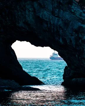 Ship into cave Stock Photos