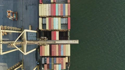 Ship with containers at commercial dock. Video stock 137159471