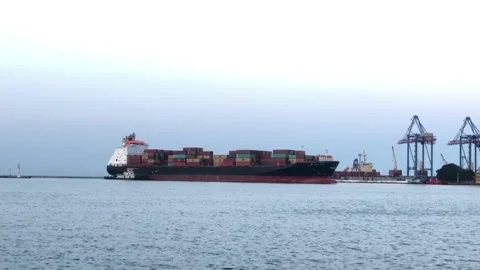 Ship with containers in the sea port. unloading a ship with containers Stock Footage 197681567
