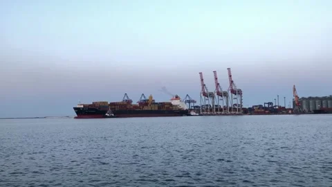Ship with containers in the sea port. unloading a ship with containers Video stock 201528354