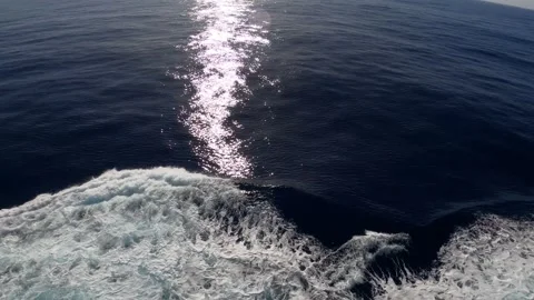 Ship creates foaming wake as it navigates the waters of Antarctic 動画素材 335194805
