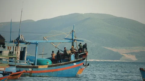 Ship crew pulls anchor aboard Stock Footage 125871560
