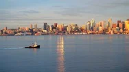 Ship Crosses River Next To Seattle Skyline By Aerial Drone Stock Footage