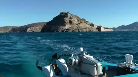 Ship departs from Spinalonga Island Stock Footage 8974413