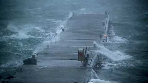 Ship dock pier rocking violently in hurricane force rain and wind,Iceland Stock Footage 47853405