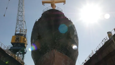 A ship in a dock for repair Stock Footage 87613085