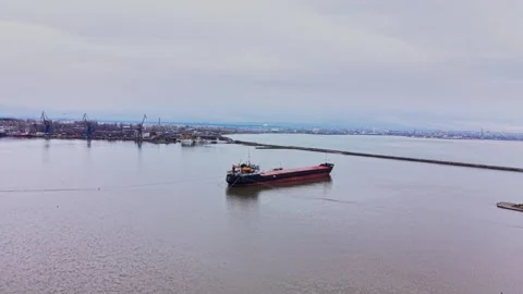 Ship docked at shipyard during overcast weather Stock Footage 337940723