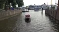 Ship driving in side channel in Hamburg harbour HD Footage
