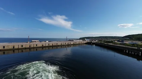 Ship Engines Creating Wake in Calm Baie-Comeau Harbor, Quebec, Canada Stock Footage 339437359