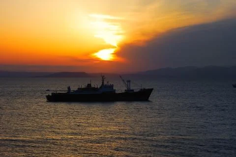 Ship in evening sea Stock-Fotos