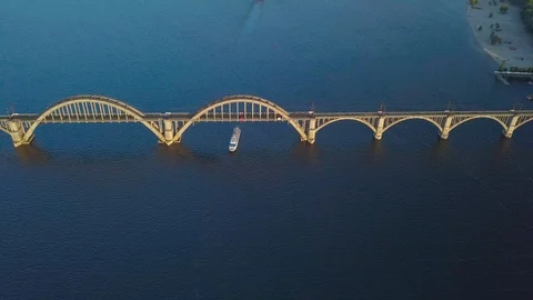 Ship floating on river under bridge Video stock 109806597