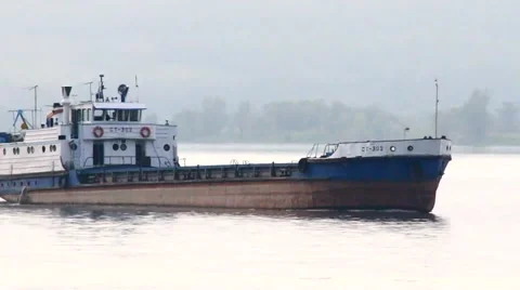 Ship floats down the river Stock Footage 40878515