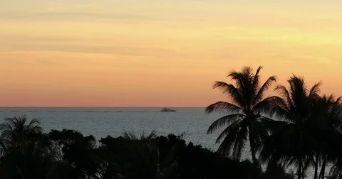 The ship floats on the horizon at sunset Video stock 73112943