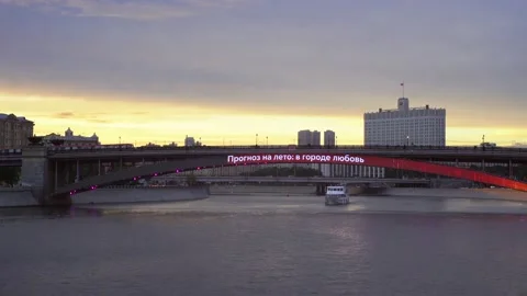 The ship floats on the river, subway train on the background of sunset and the w Stock Footage 155130832