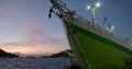 Ship front with anchor at sunset in indonesian harbor 4k or 4k+ Resolution