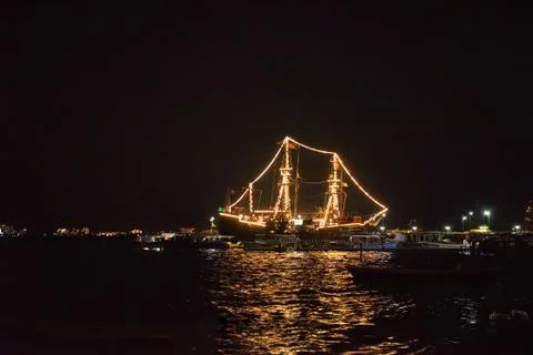 Ship glowing in the sea Stock Photos